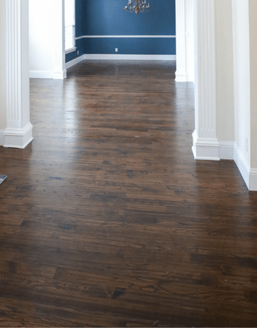 Waterproof laminate flooring hallway with wood-look planks