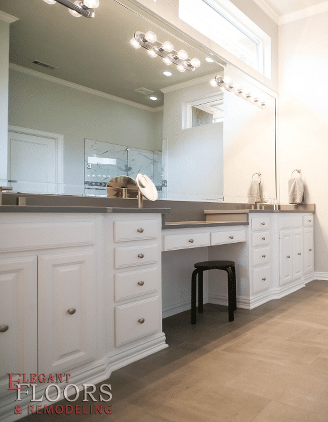 Bathroom with wood-look laminate flooring and vanity