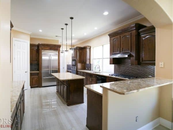 Traditional Kitchen With Dark Wood Cabinetry Kitchen Remodel by Elegant Floors and Remodeling project photo