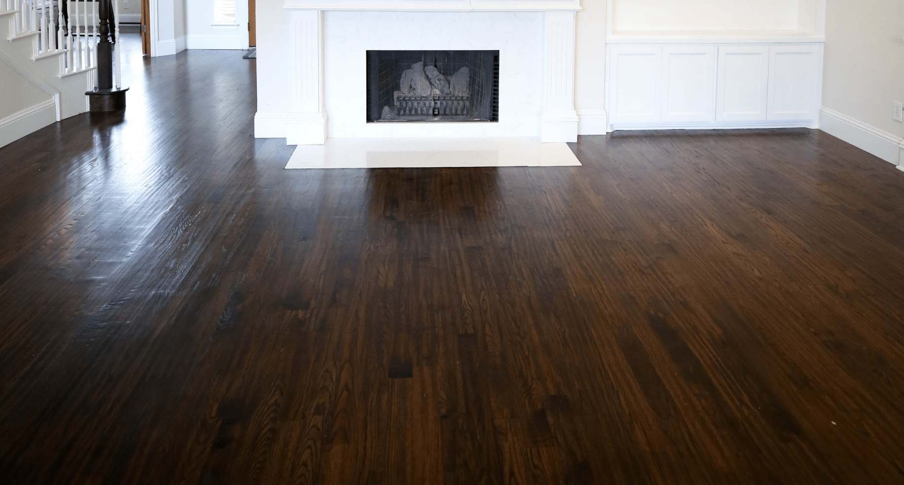 LVP vs laminate comparison: rigid-core luxury vinyl plank in a bright living space